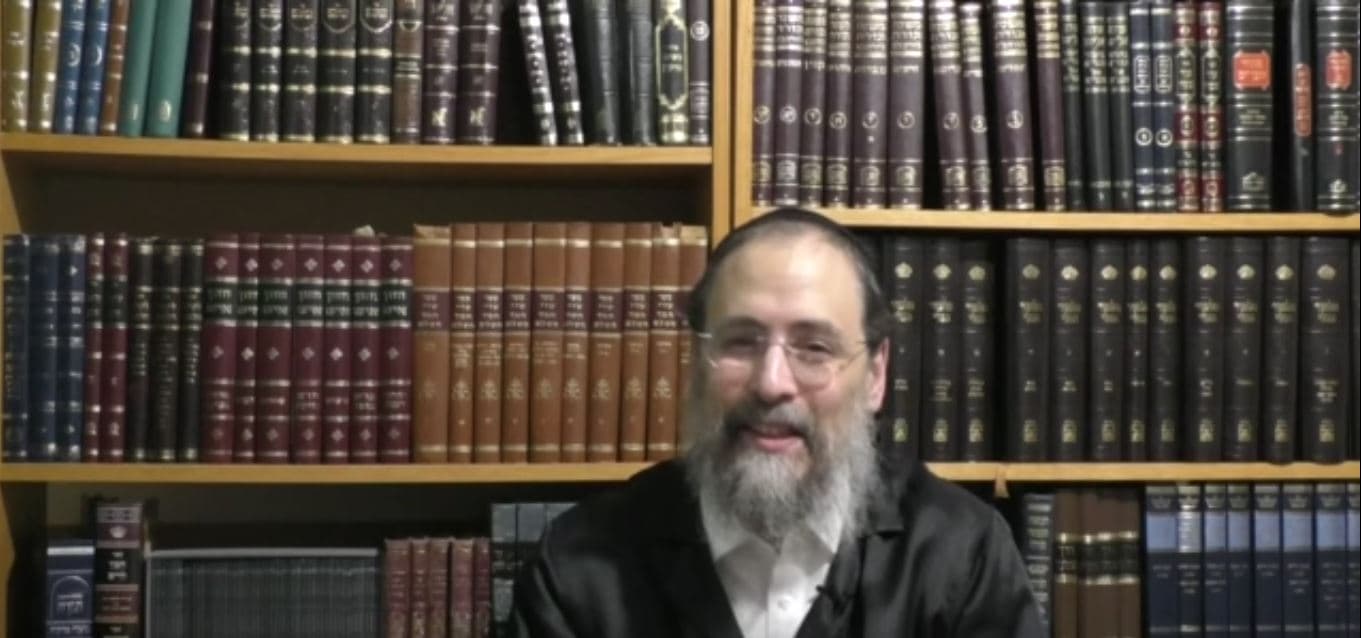 Man giving Torah lecture in a study room Man giving Torah lecture in a study room