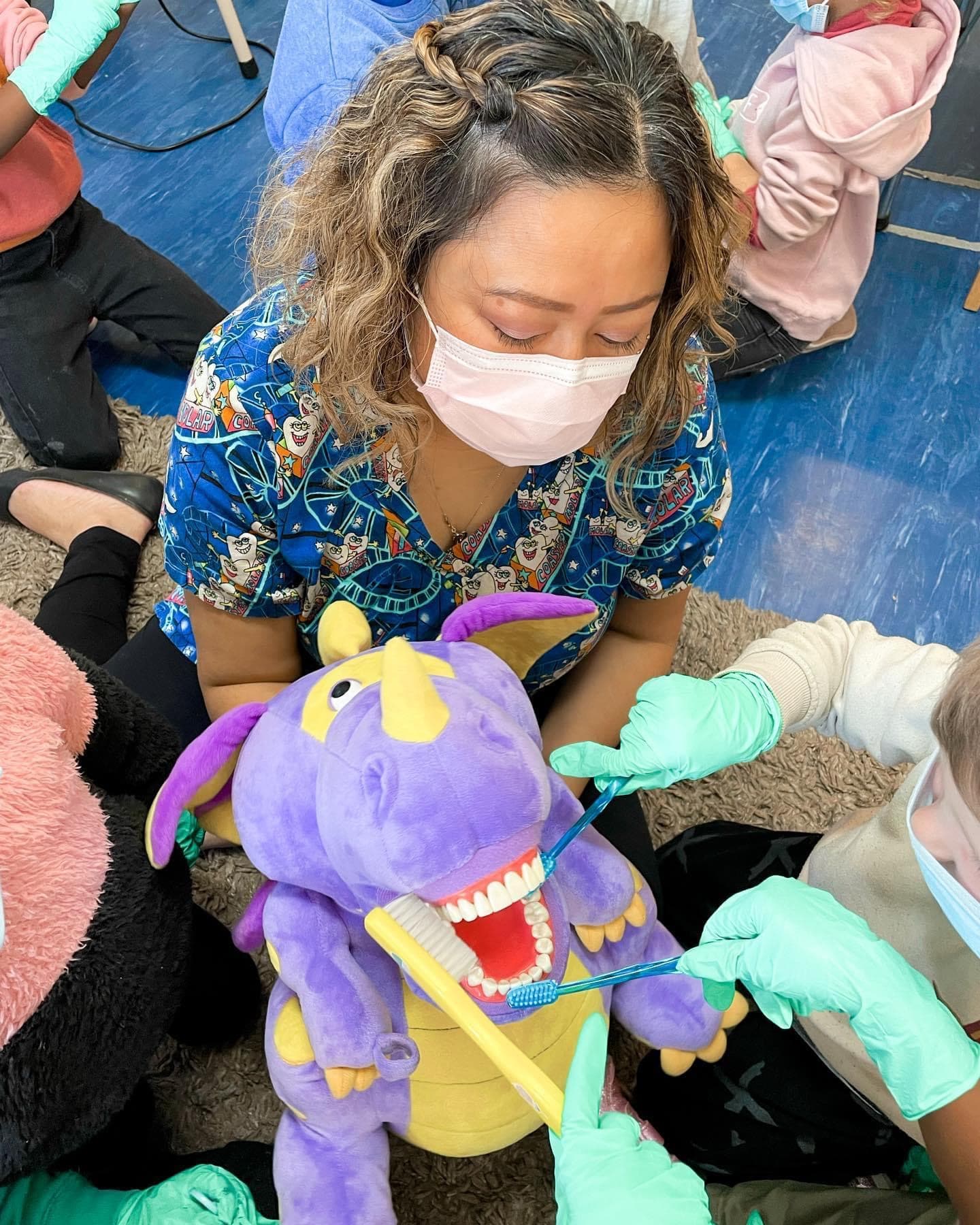 Children engaging in oral health activities at daycare center Children engaging in oral health activities at daycare center