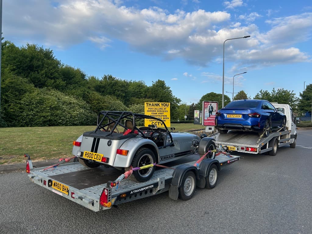 recovery truck transporting vehicles recovery truck transporting vehicles