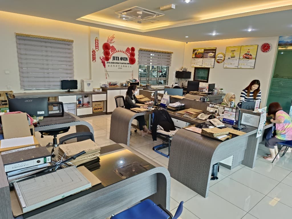insurance agent assisting client insurance agent assisting client