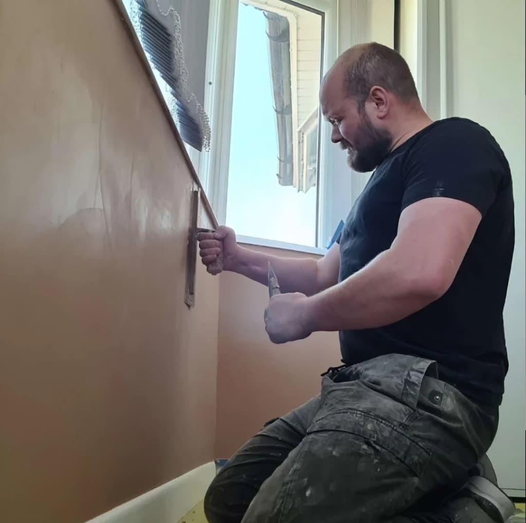 installer applying insulation materials installer applying insulation materials